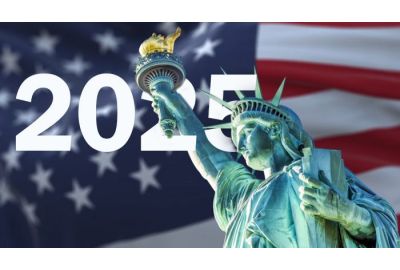 Statue of Liberty with blurred American flag waving in the background